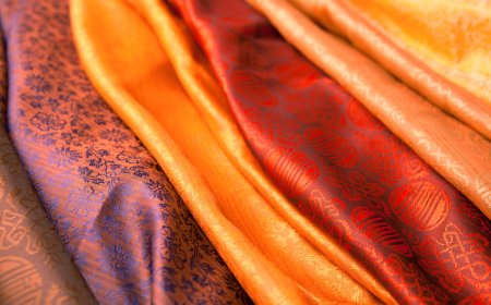From Natural to Glam: Jute Fabric, Pure Silk, Net Fabric Online & Organza Embroidery Fabric Explained